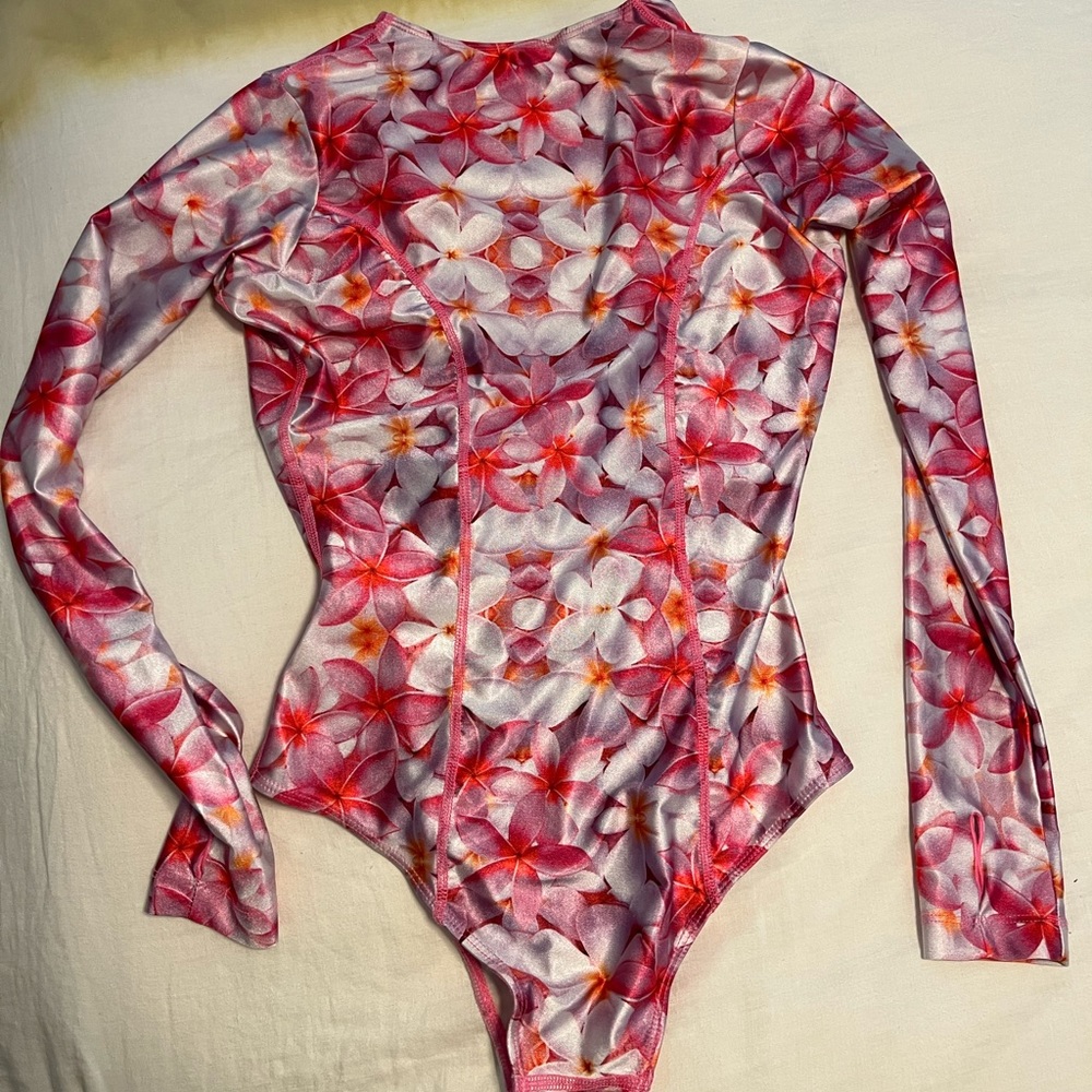 Pink plumeria spf one piece